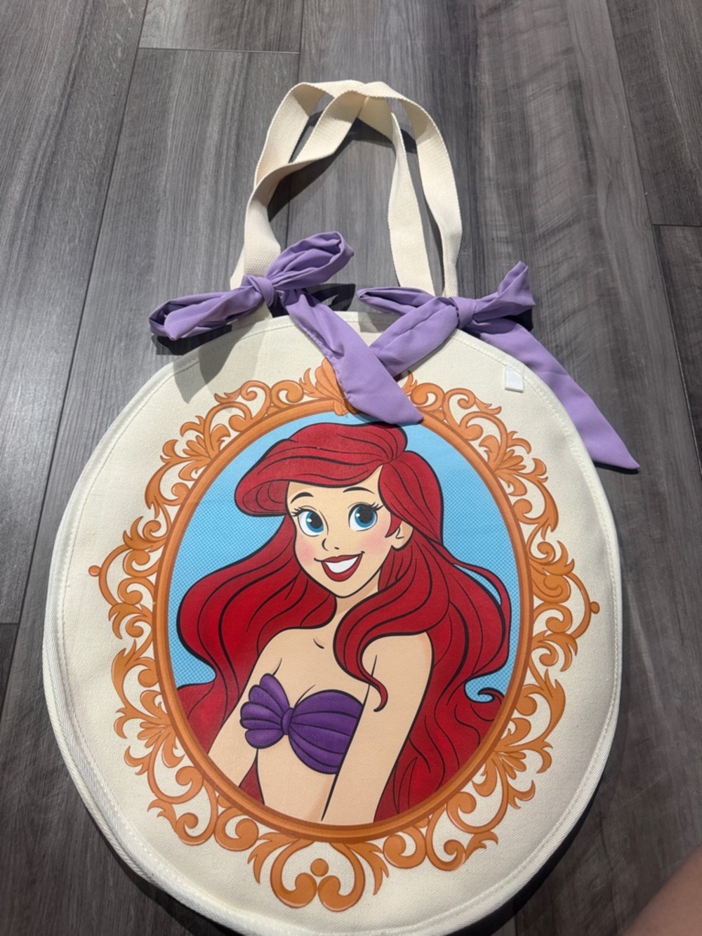 Oval Canvas Tote Bag with Purple Accents and Ariel Artwork